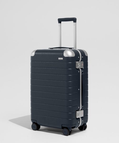 The Aluminum Edge Bigger Carry-On in Navy Blue