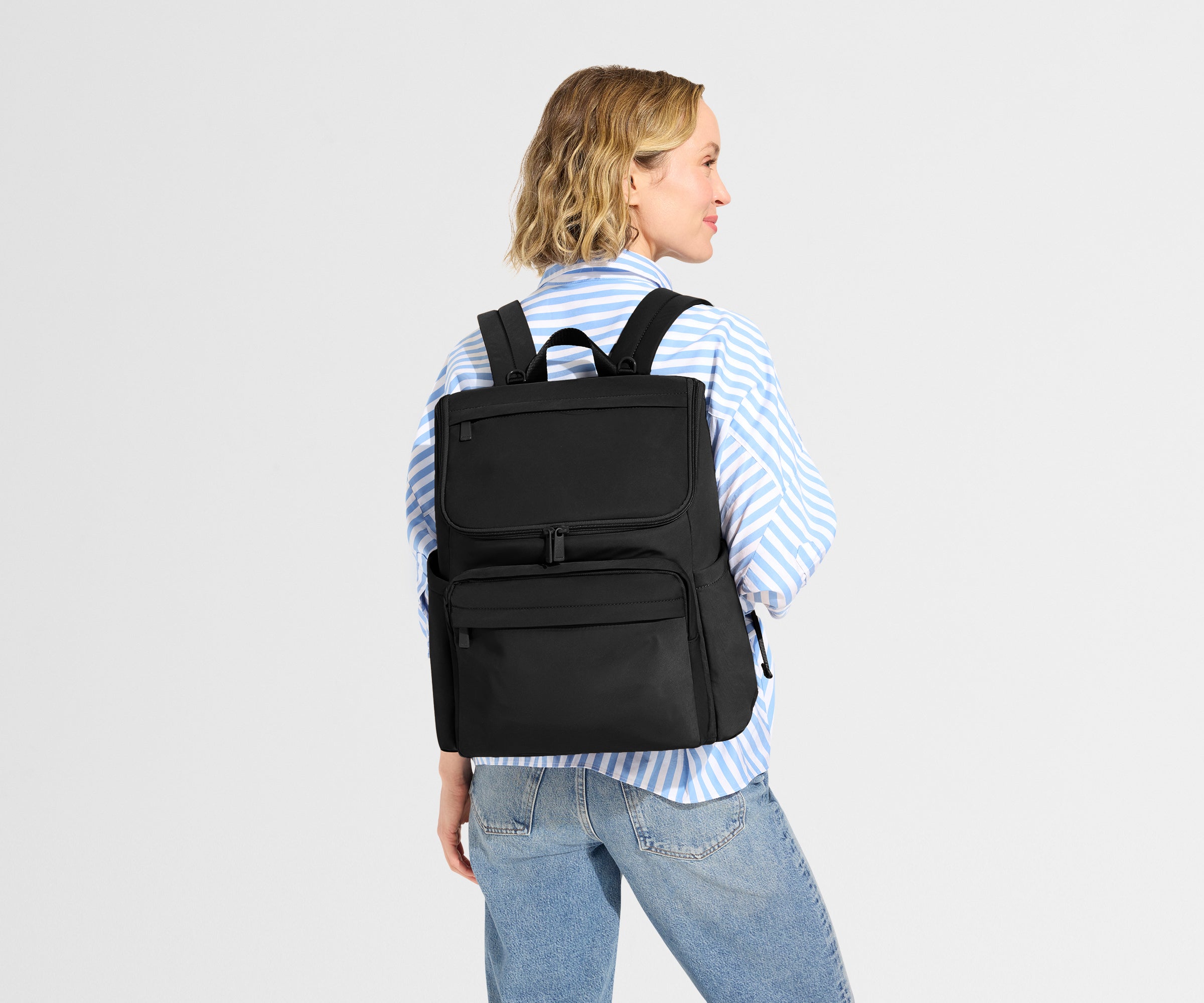 PDP_Featherlight_Diaper_Backpack_Black_Talent_01.jpg
