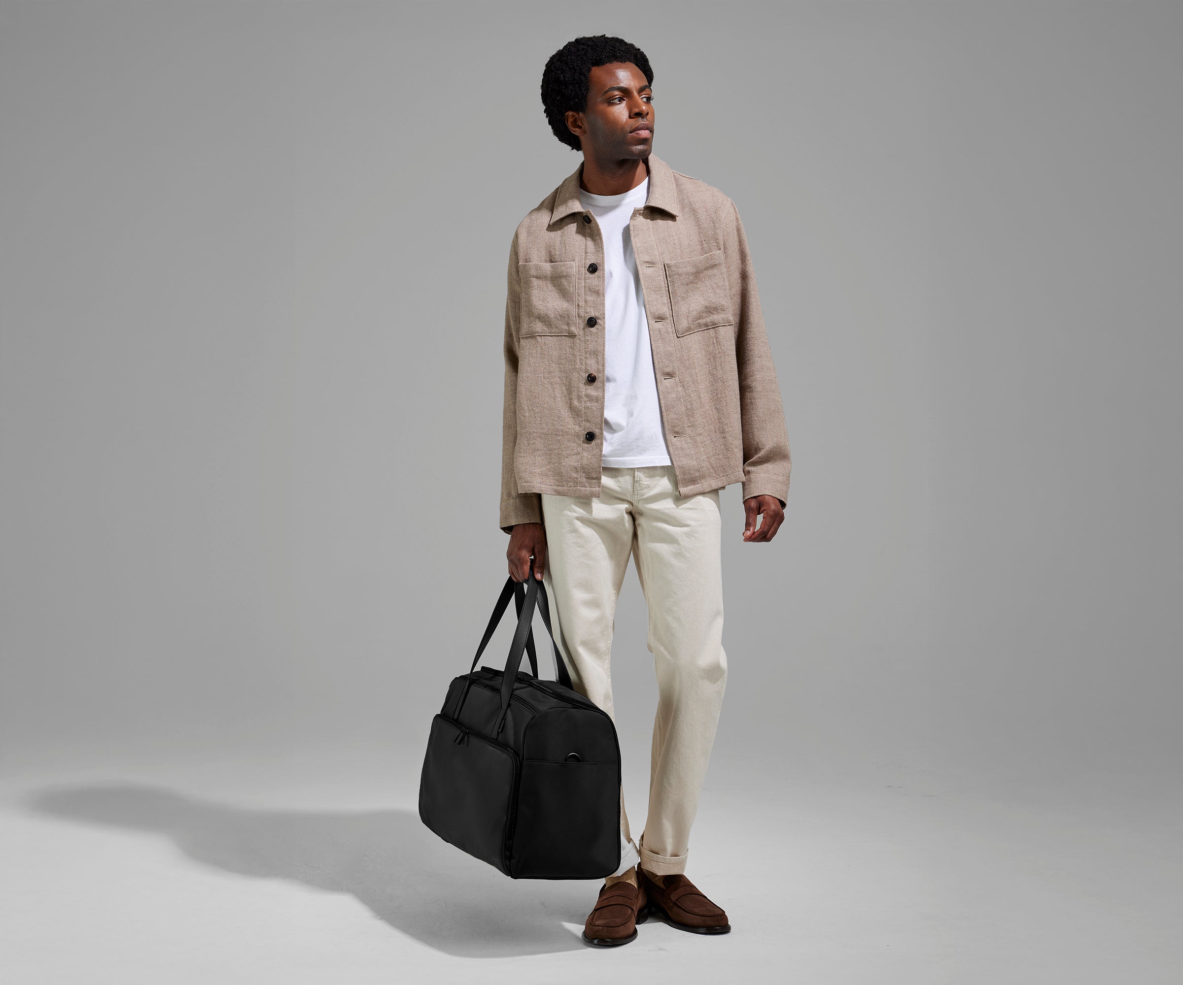 PDP_Garment_Duffle_Black_Talent_01.jpg