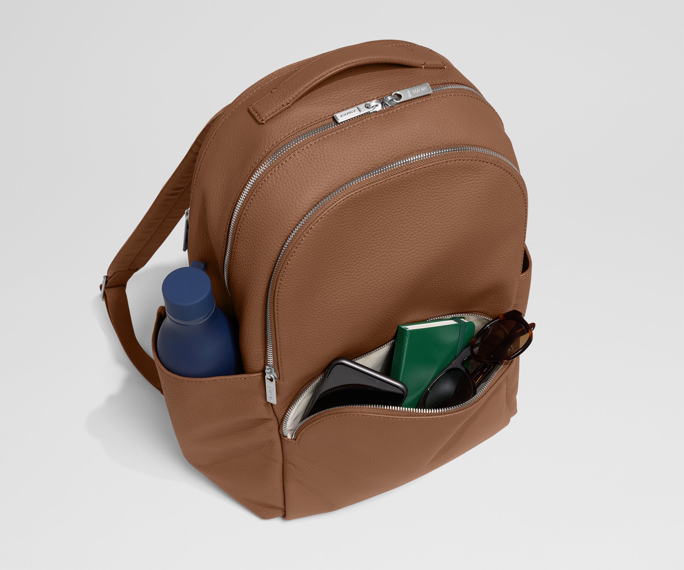 PDP_MeridianLeather_Backpack_Brown_FrontPocket.jpg