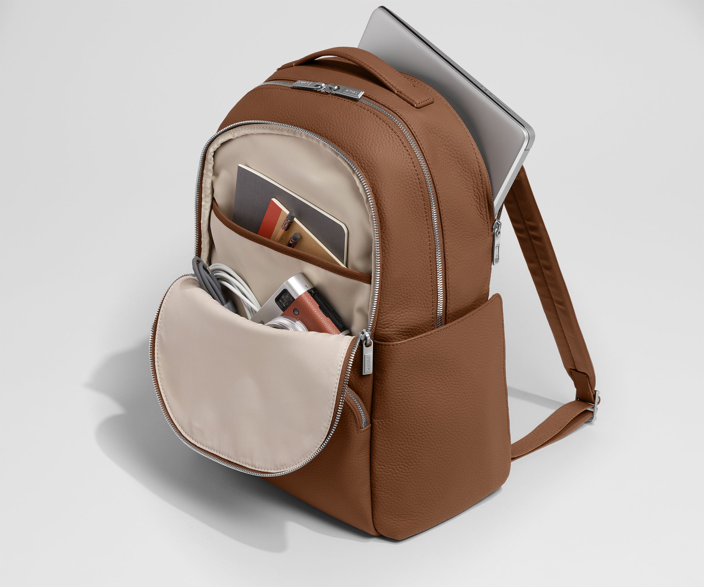 PDP_MeridianLeather_Backpack_Brown_MidPocket.jpg